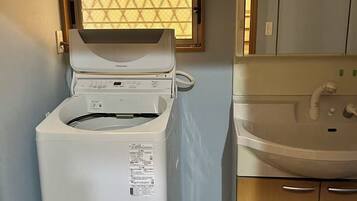 Hair dryer, bidet, towels, soap