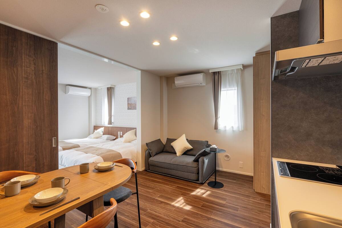 Appartement Deluxe | Coffres-forts dans les chambres, rideaux occultants, Wi-Fi gratuit