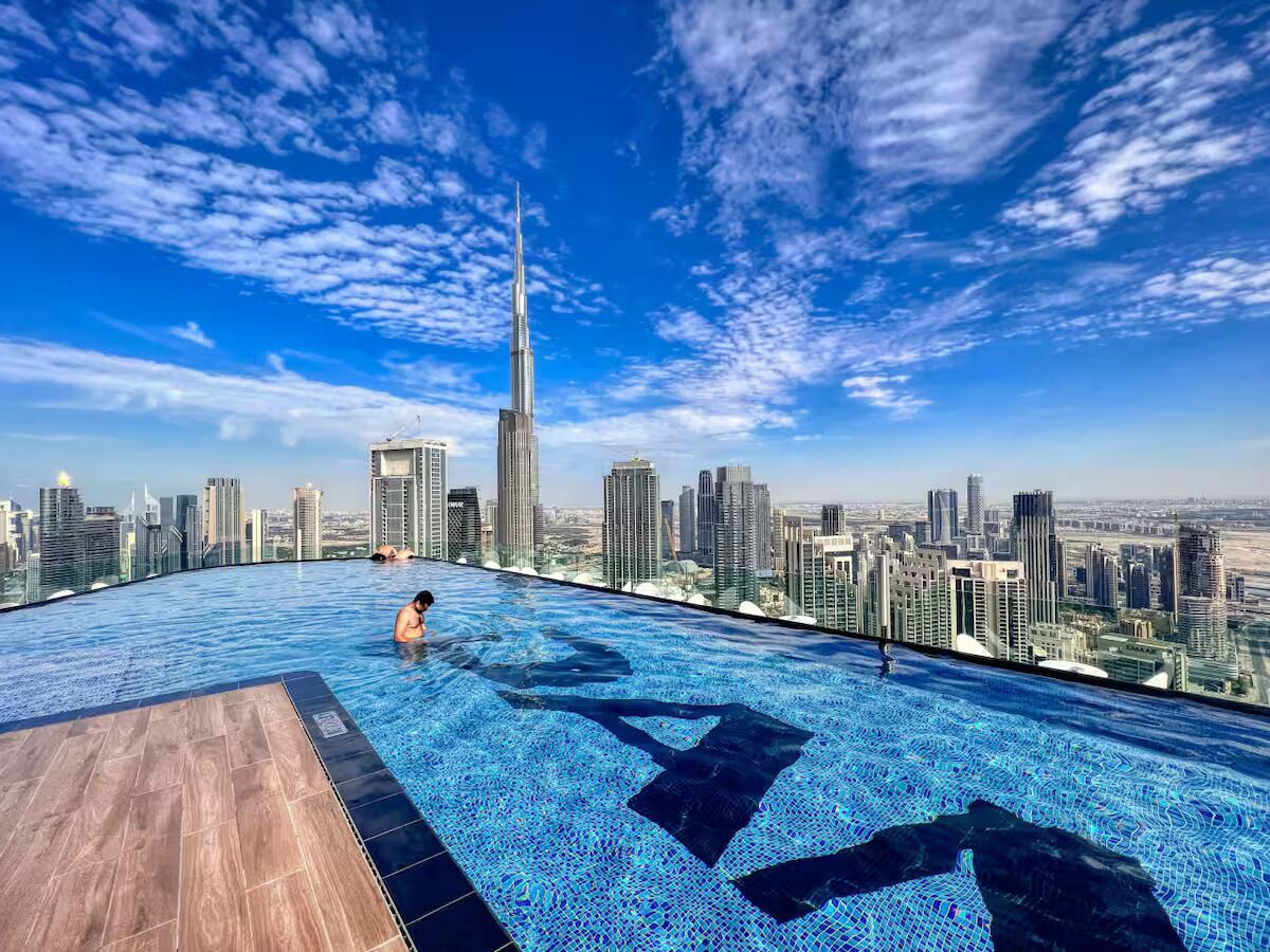 Outdoor pool, open 7:00 AM to 7:00 PM, pool umbrellas, pool loungers