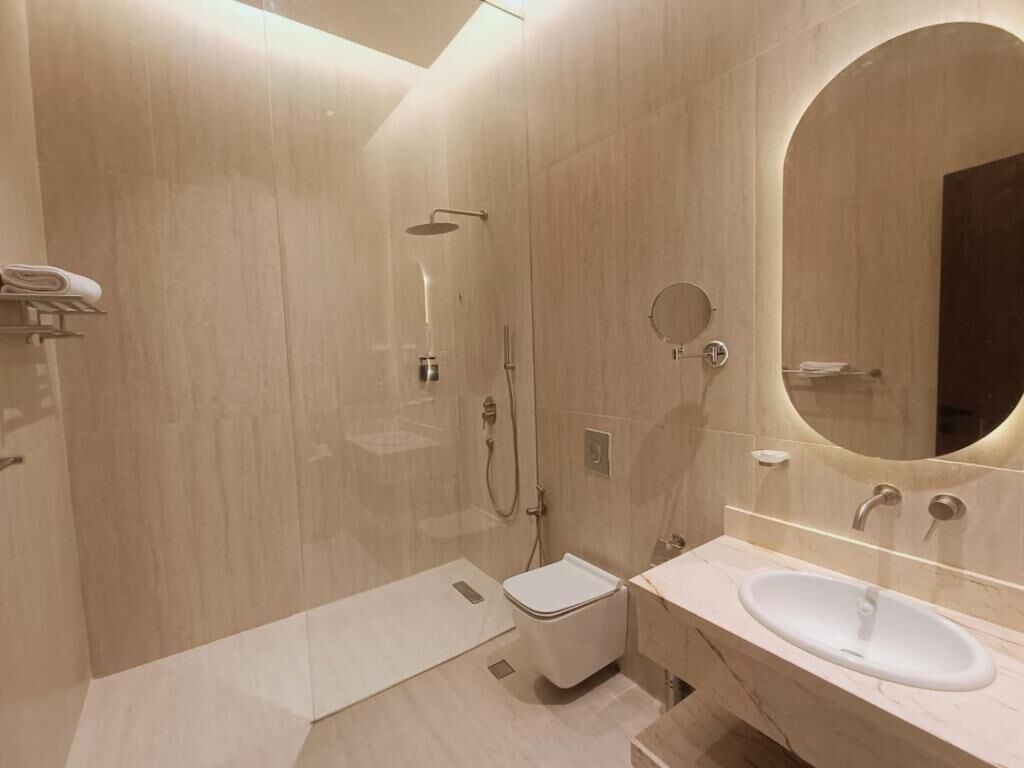 Family Suite | Bathroom | Hair dryer, slippers, towels