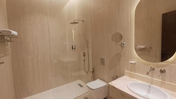Family Suite | Bathroom | Hair dryer, slippers, towels