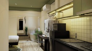 Een moderne keuken met een ingebouwde oven, een spoelbak en een aanrecht.