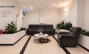 Inviting shared lounge with plush seating and a calm, modern feel - Cosy Private Room in Marrickville | Prime Location (Marrickville)