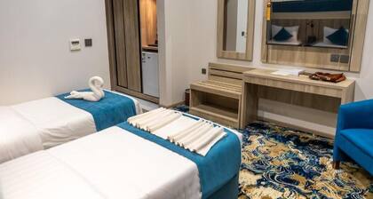 Paradise Land Hotel Al-Shohada