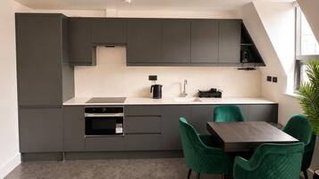 Standard Apartment, 2 Bedrooms | Private kitchen | Full-sized fridge, microwave, oven, stovetop