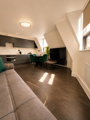 Departamento estándar, 2 habitaciones | Área de sala de estar