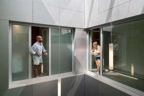 A modern building with large windows and a glass facade. - Fahana Canteras (LAS PALMAS DE GRAN CANARIA)