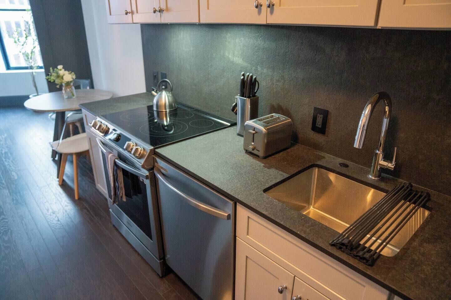 Coffee/tea maker, fridge, microwave, oven