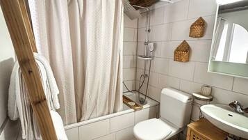 Hair dryer, towels, soap, shampoo