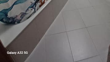 Hair dryer, bidet, towels, toilet paper