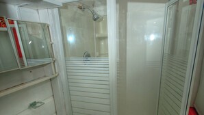 Shower, towels, soap, toilet paper