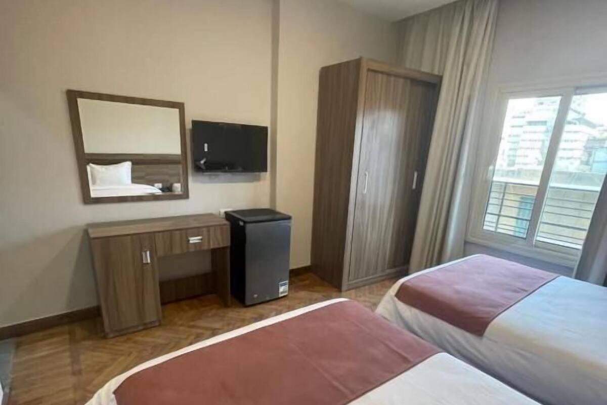 Deluxe kamer, 1 twee- of 2 eenpersoonsbedden, uitzicht op stad | Verduisterende gordijnen, geluiddichte muren
