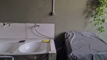 Shower, towels, soap, toilet paper