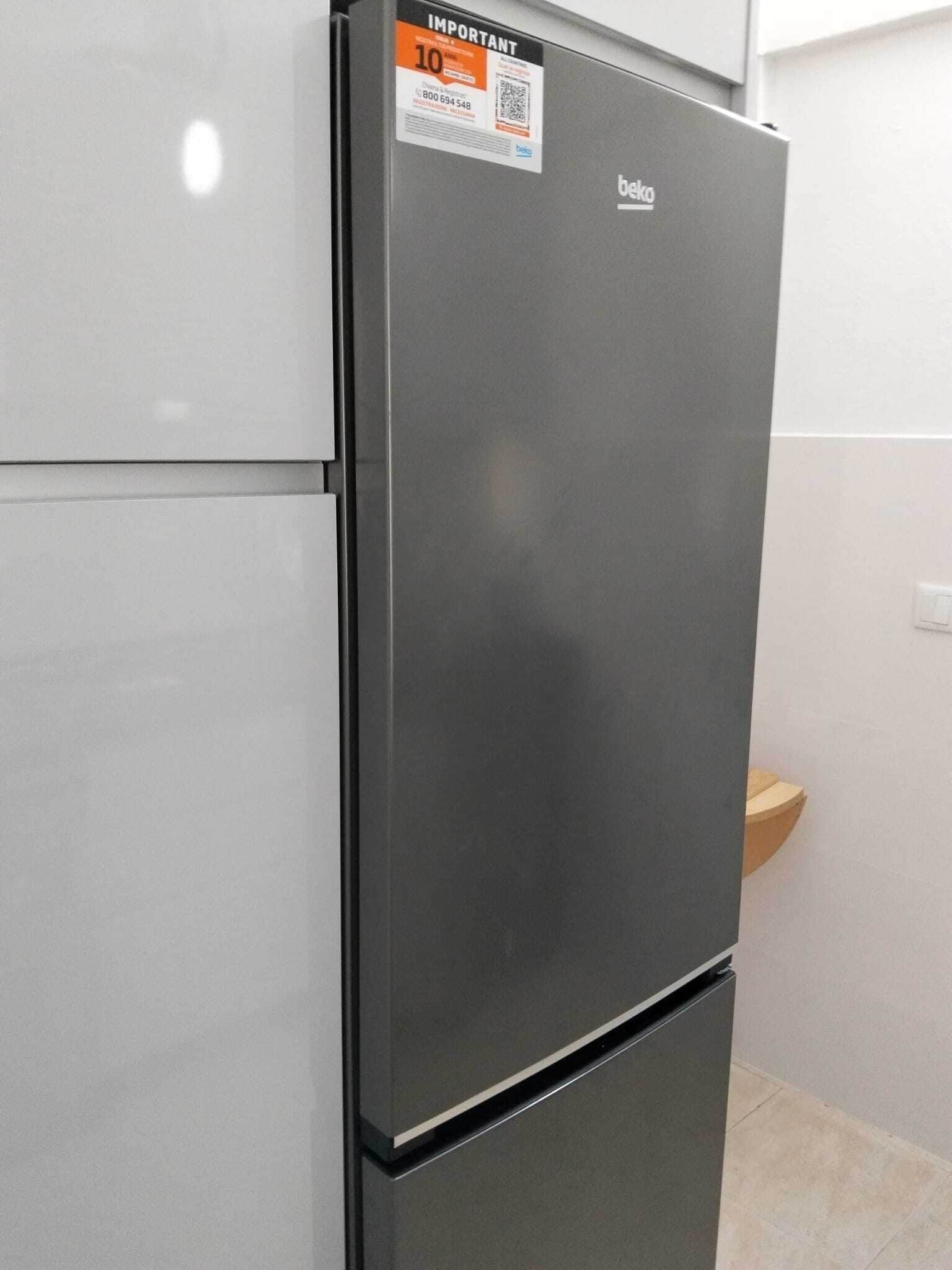 A two-door refrigerator with a prominent 'Important' sticker and a 'beko' logo.