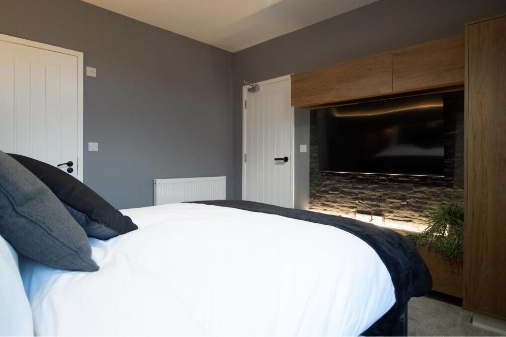 Habitación doble Deluxe, baño privado | Escritorio, espacio para trabajar con laptop y insonorización 