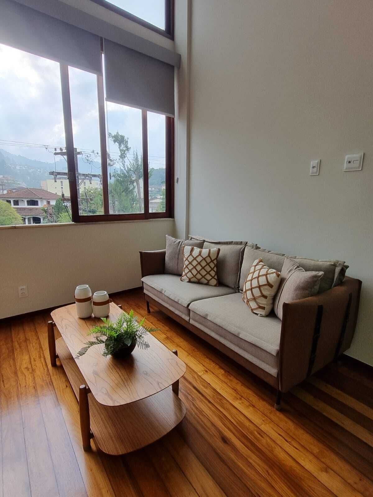 Loft, vista a la ciudad | Área de sala de estar