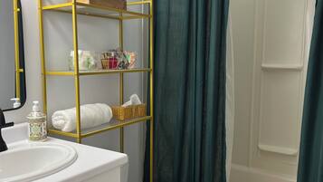 Hair dryer, towels, soap, toilet paper