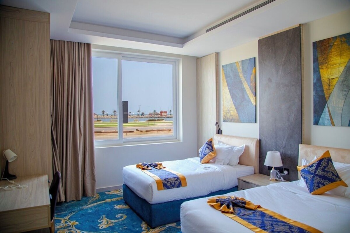 Junior Suite, Ground Floor | In-room safe, blackout curtains, iron/ironing board, bed sheets
