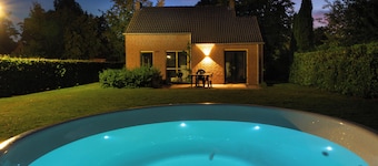 Goldenescape 6-person cottage with a hot tub and large garden.