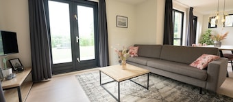 Goldenescape 6-person cottage with a hot tub and large garden.