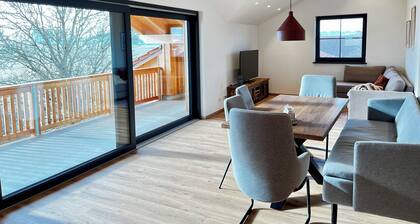 Modern apartment with a balcony and panoramic views on a farm