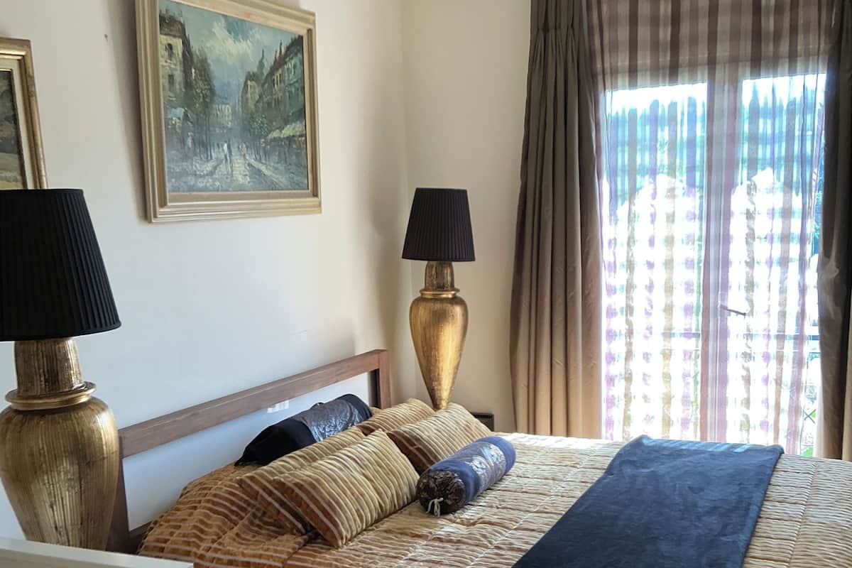 Suite Deluxe, vue plage | Fer et planche à repasser, Wi-Fi gratuit