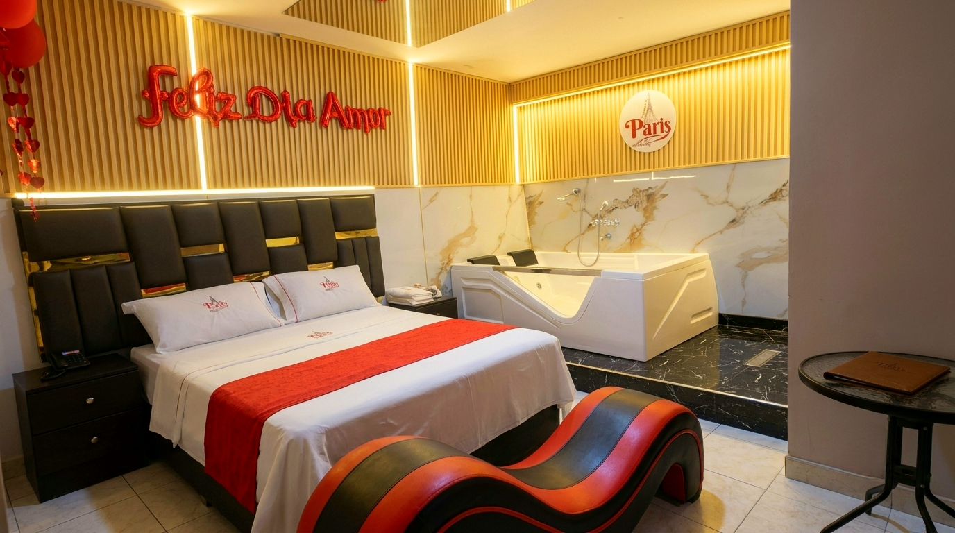 A hotel room with a bed, a massage chair, a bathtub, and a minibar.