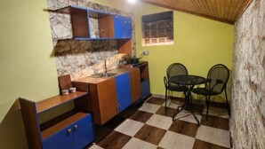Family Room, Balcony, Mountain View | Shared kitchen | Fridge, shared microwave, stovetop, cookware/dishes/utensils