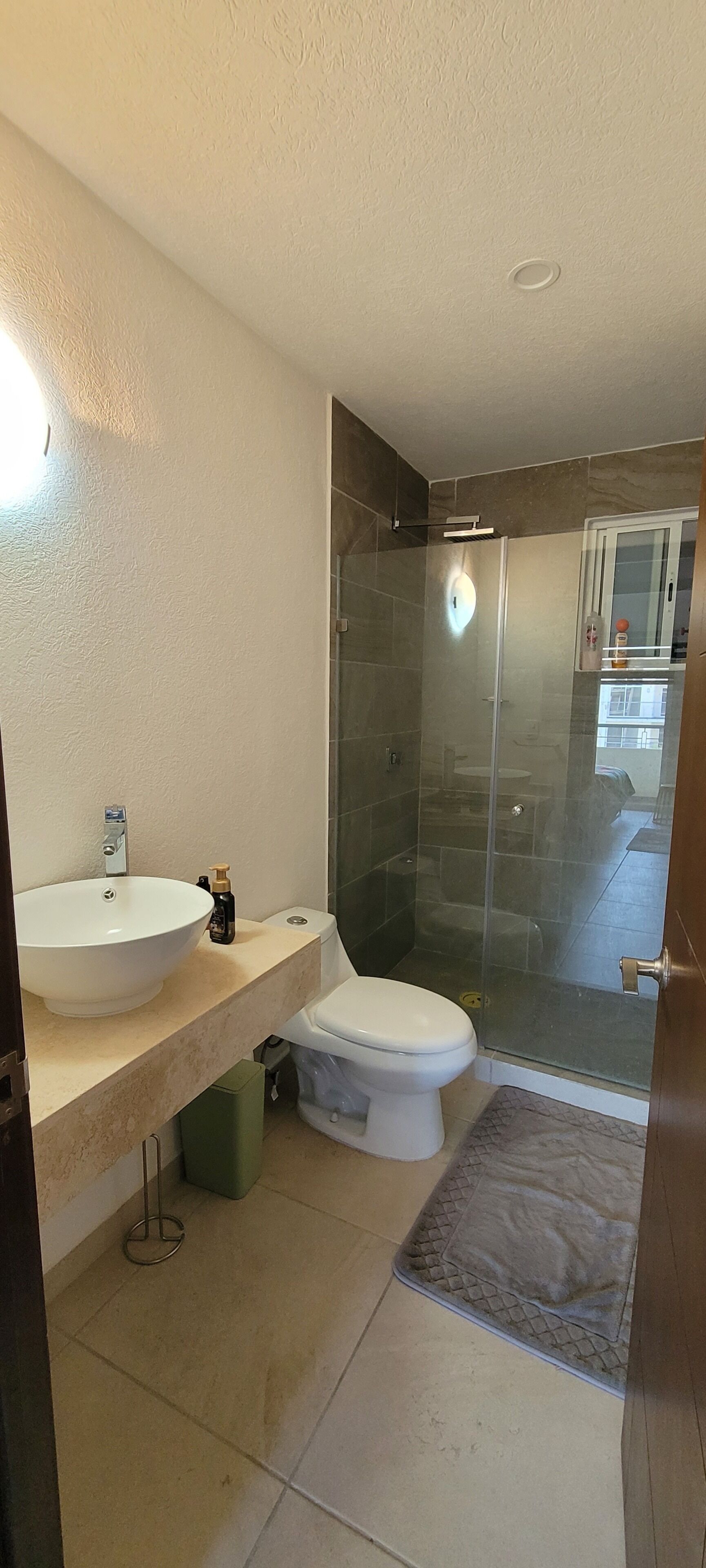 Shower, towels, soap, toilet paper