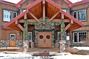 Step through the charming timber entry dressed for the season. - Live the Lodge Life | Luxe Home Near Trails & Spa Amenities (Whitefish)