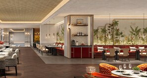 A modern restaurant with a long dining area, high ceilings, and a central island with seating.