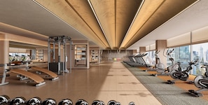 A modern gym with treadmills, elliptical machines, and weight equipment. - Anor And Saffron Tashkent, Curio Collection By Hilton (Tashkent)