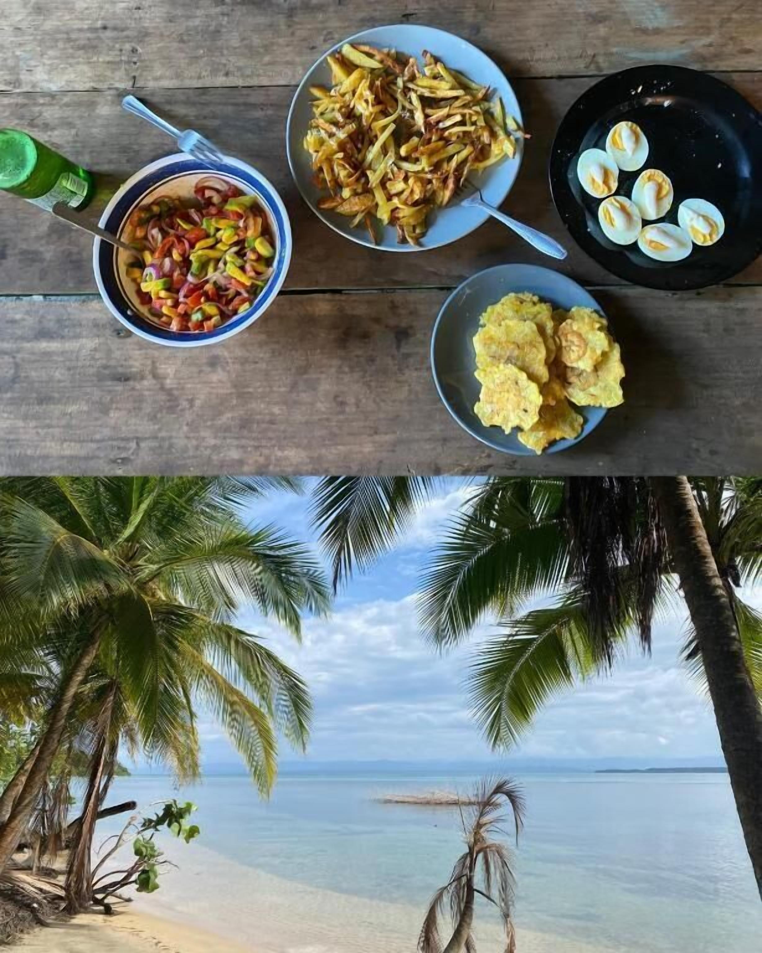 Una mesa de madera con diversos platos, incluyendo un tazón de verduras mixtas, una porción de papas fritas, un plato de huevos y una bandeja de alimentos fritos.