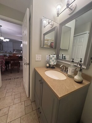 Shower, hair dryer, towels, soap - 2 Bedroom Titusville townhome - your Space Coast Home Base for 30+ Day Stays (Titusville)