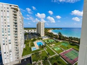 Exterior - Oceanfront 1BR Condo with Stunning Beach Views & AC (Luquillo)