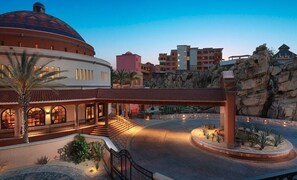 A hotel with a large dome, a central courtyard, and a rocky landscape. -  Playa Grande Penthouse 2-Bedroom Suite on the Ridge Christmas & New Years weeks (Cabo San Lucas)