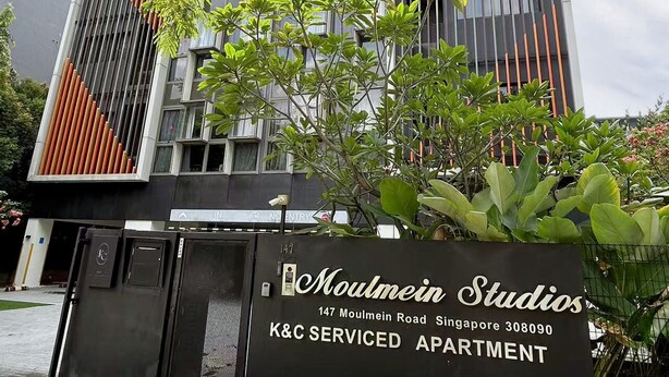 A modern building with a sign for 'Moulmein Studios K&C Serviced Apartment' at 147 Moulmein Road, Singapore. - Moulmein Studios by K&C Serviced Apartment (Singapore)