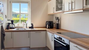 Coffee/tea maker, fridge, oven, stovetop - 3 bedroom stunning home in Juelsminde (Juelsminde)