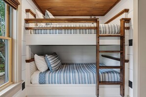 A bunk bed with a wooden ladder, white walls, and a window. - Crescent Lake 1-Min Walk to Public Beach, Boat Launch, Kayaks, Paddleboards (Raymond)