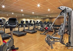 A gym with treadmills, elliptical machines, and weightlifting equipment. - Steamboat Springs | Mountain Ski | Ski Access & Hot Tub (Steamboat Springs)