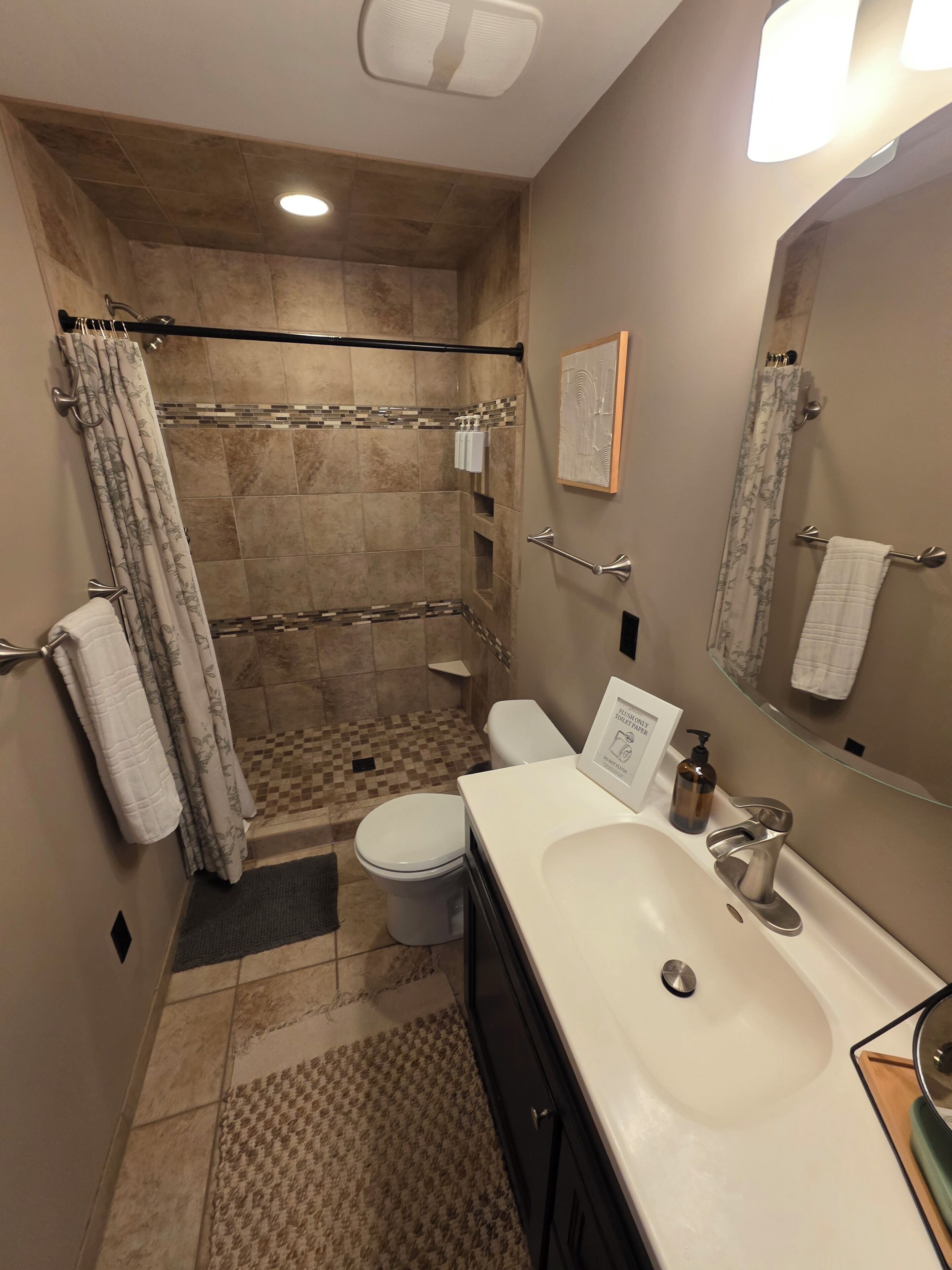 Hair dryer, towels, soap, toilet paper