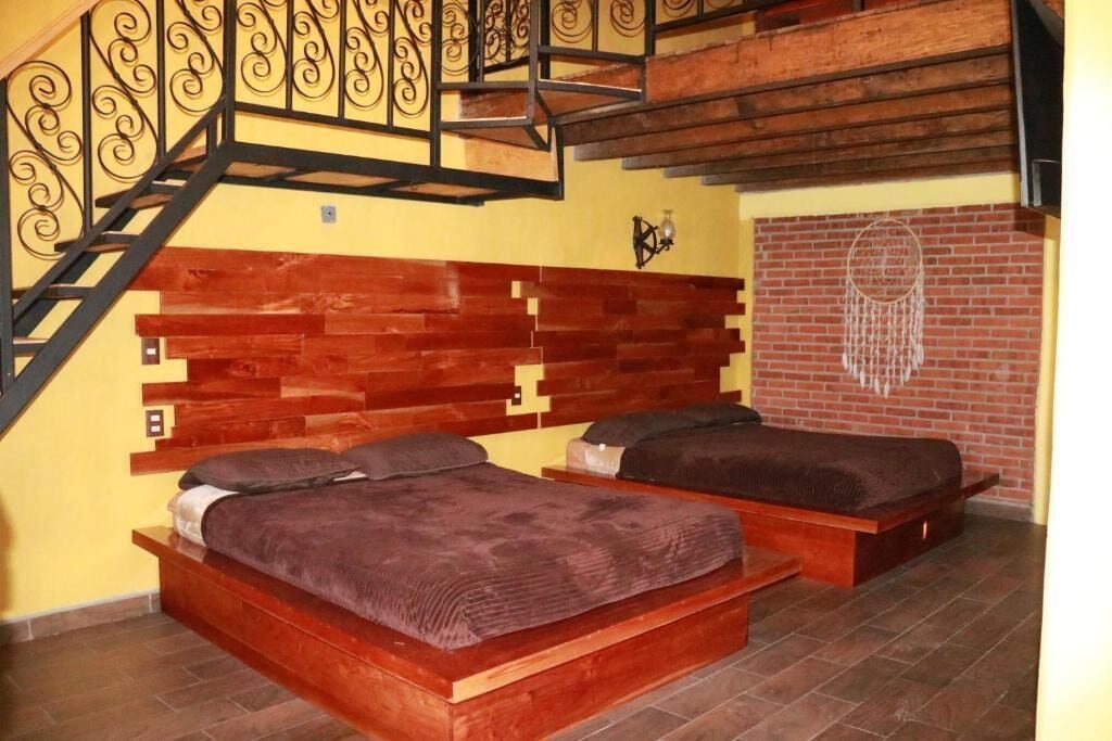 Habitación cuádruple Deluxe, vista al jardín