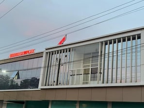 A building with a sign that reads 'ZAHRA COMPLEX.'