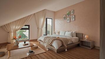 A bedroom with a bed, bedside table, lamp, and a window with curtains.