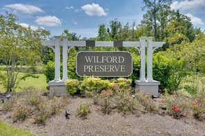 A sign for Wilford Preserve with a white archway and a signboard. - Orange Park 'The Gathering House' w/ Pool Access (Orange Park)