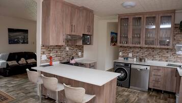 Coffee/tea maker, fridge, microwave, oven