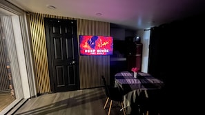 A room with a closed door, a flat-screen TV on the wall, a table with a vase, and a chair. - Luxury KIA house
Double room private
C3 (Richmond Hill)