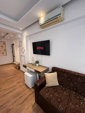 Quarto casal conforto | Área de estar