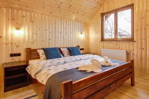 Appartement « Stone and Wood » avec jacuzzi et aire de jeux pour enfants