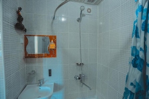 Twin Room, City View | Bathroom | Slippers - Yasmin Hotel (Bukhara)